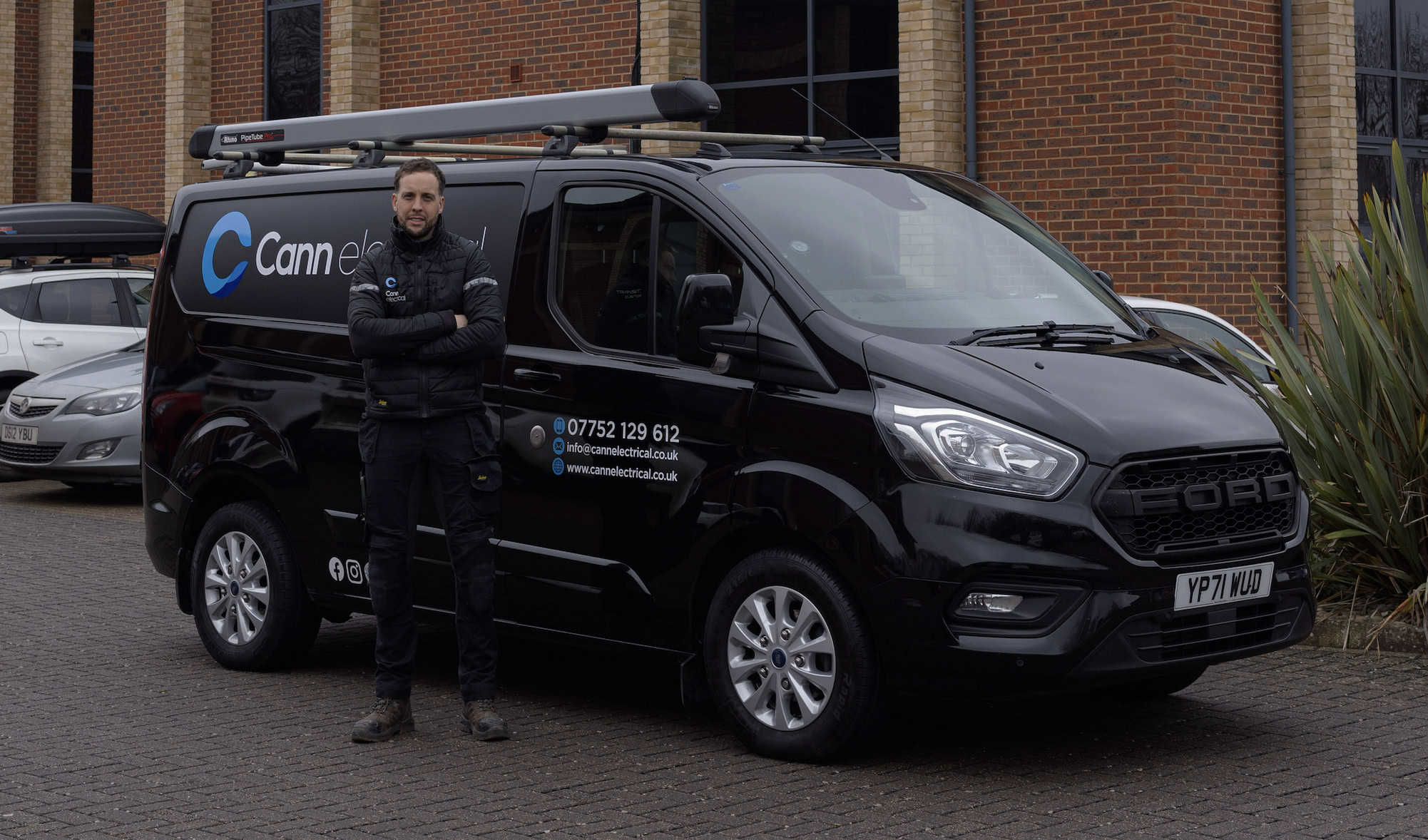 Matthew Cann with the Cann Electrical van